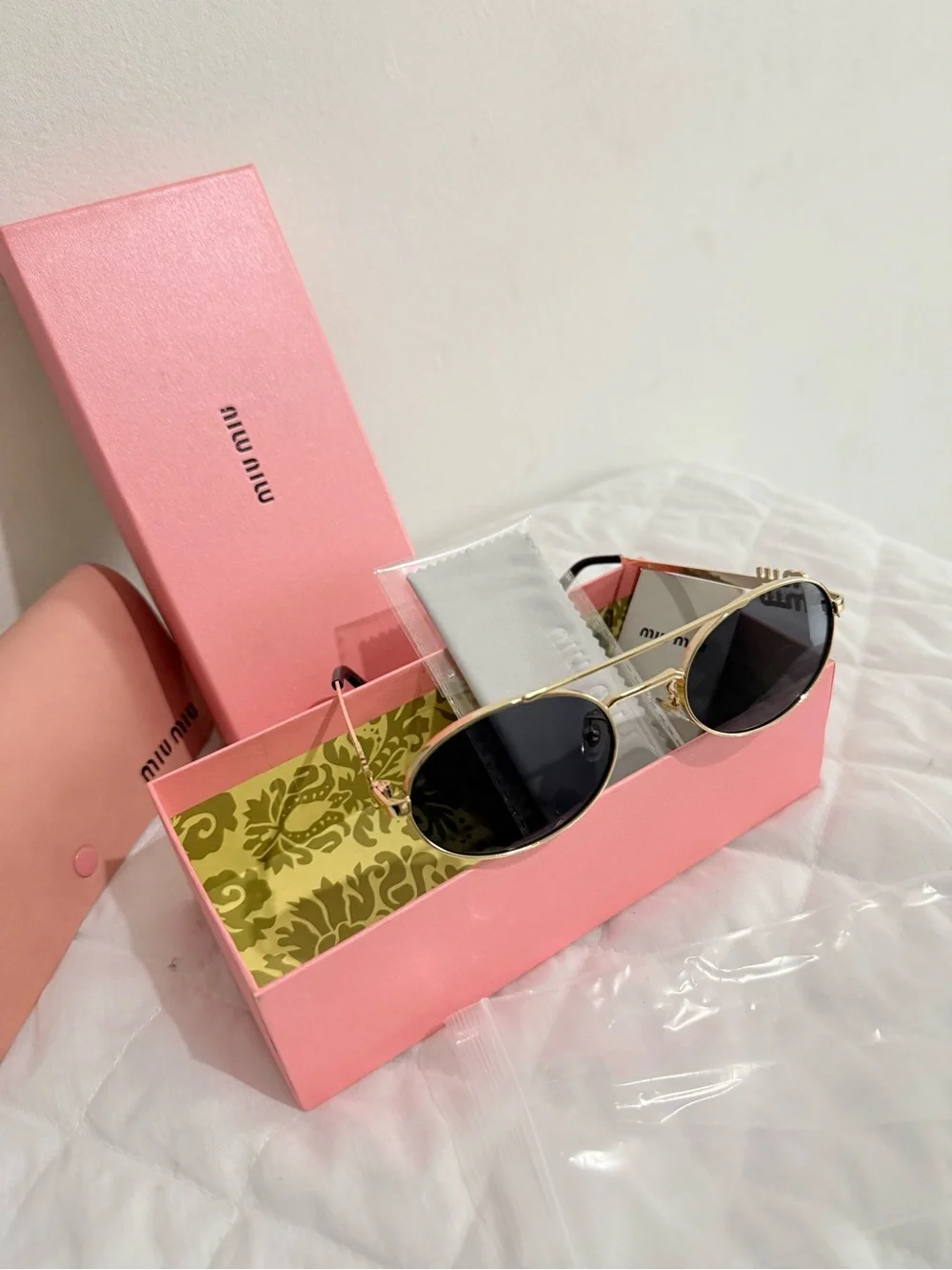 Miu Miu Gold Frame Black Lens Sunglasses with Pink Case